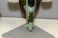 113e